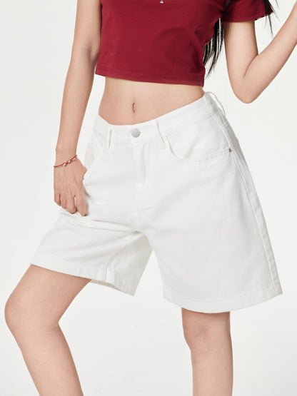 YEEYEEWang Denim Bermuda Shorts in Ivory, Asian-fit cut, waist-down angled front view, one hand at side, variant thumbnail.