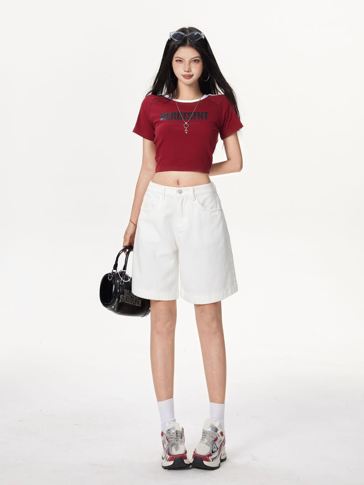 YEEYEEWang Denim Bermuda Shorts in Ivory, Asian-fit cut, full-body front standing pose, holding a black handbag, sunglasses on head.