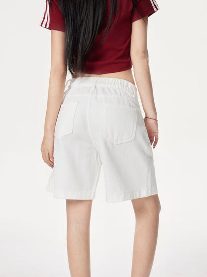 YEEYEEWang Denim Bermuda Shorts in Ivory, Asian-fit cut, waist-down back close-up, gathered elastic waistband and two back patch pockets.