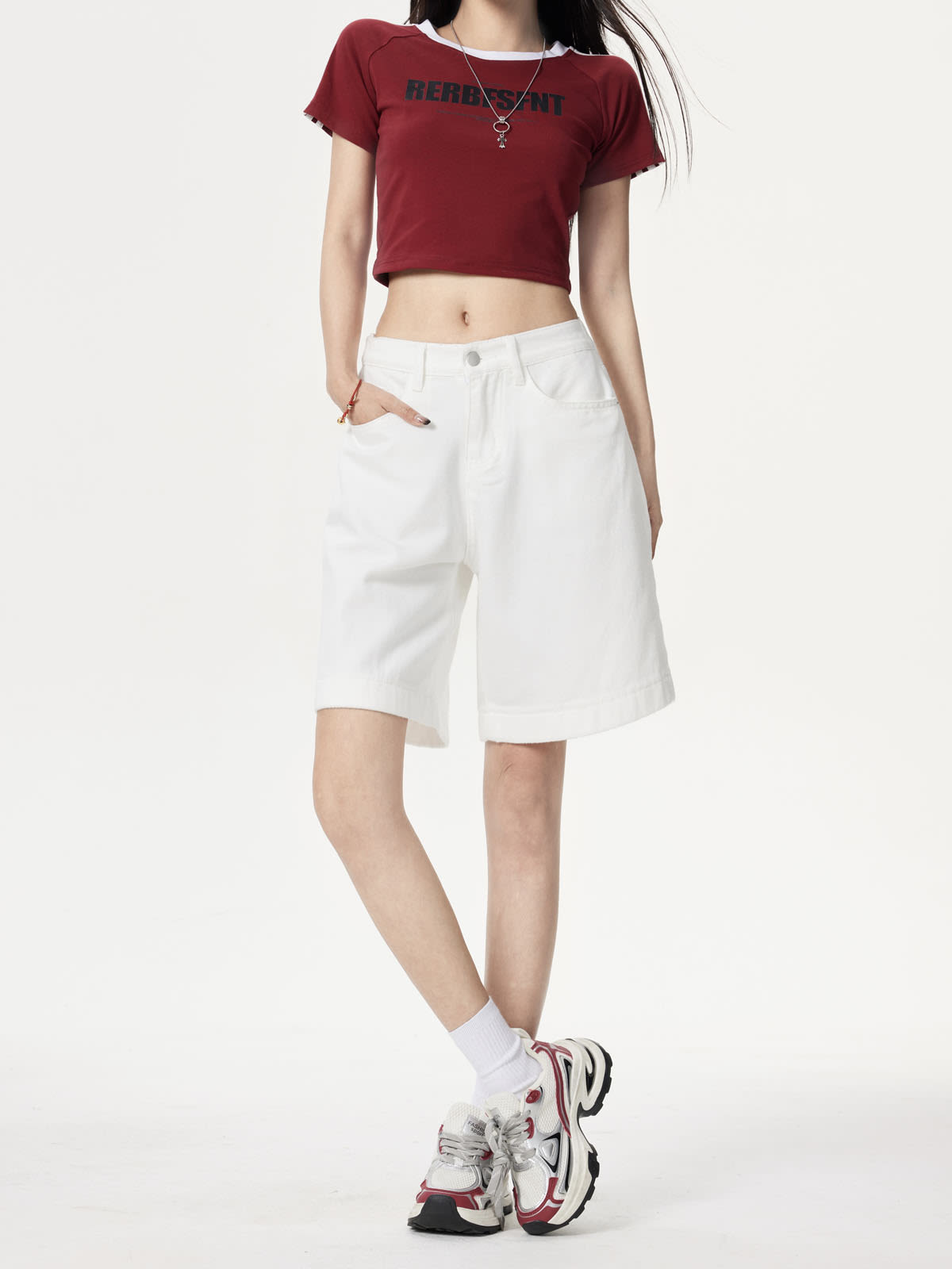 YEEYEEWang Denim Bermuda Shorts in Ivory, Asian-fit cut, waist-down front pose, one hand in front pocket, red crop tee.