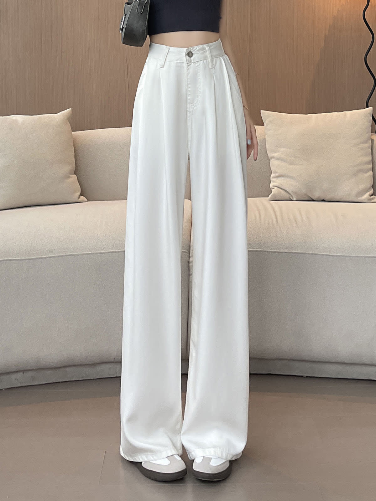 YEEYEEWang Wide-Leg Jeans in White, Asian-fit cut, waist-down standing front view with pleated waist and floor-sweeping fluid drape, variant thumbnail.