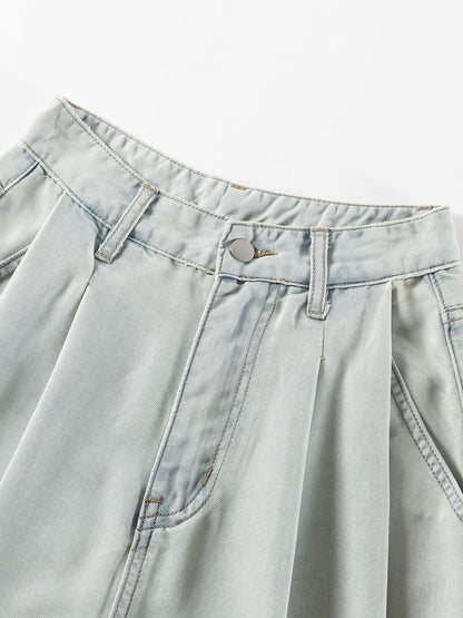 YEEYEEWang Wide-Leg Jeans in Light Blue, Asian-fit cut, close-up of pleated waistband with belt loops and silver-tone button on light wash denim.