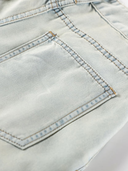 YEEYEEWang Wide-Leg Jeans in Light Blue, Asian-fit cut, close-up of back patch pocket with contrast double stitching on light wash denim.