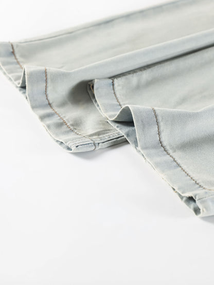 YEEYEEWang Wide-Leg Jeans in Light Blue, Asian-fit cut, close-up of layered hems with double topstitching on light wash denim.