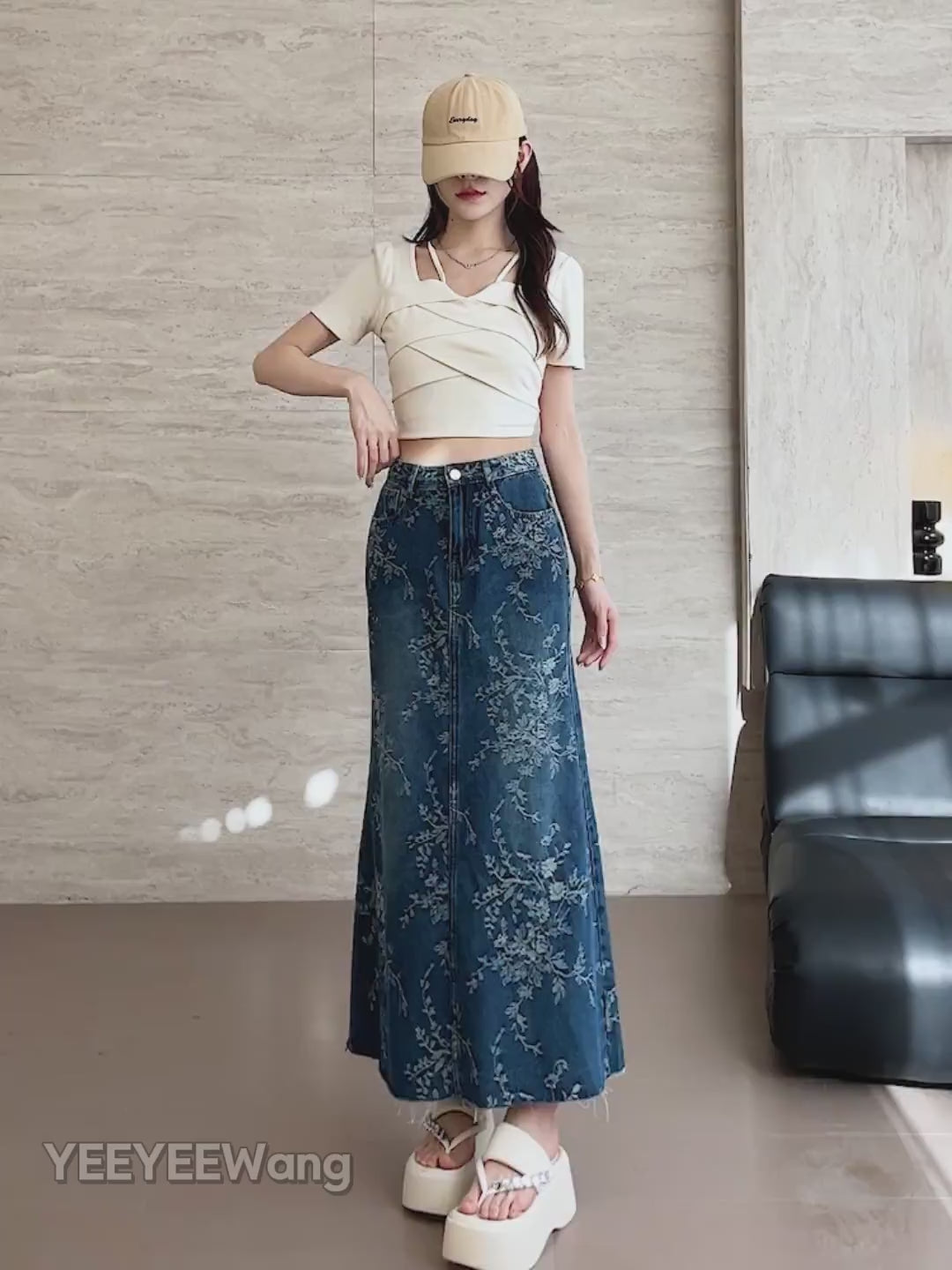 YEEYEEWang Denim Maxi Skirt video in Blue: Asian model walks, poses hands-on-hips, pockets and leg-lift, showing high-rise A-line drape and floral ankle hem.