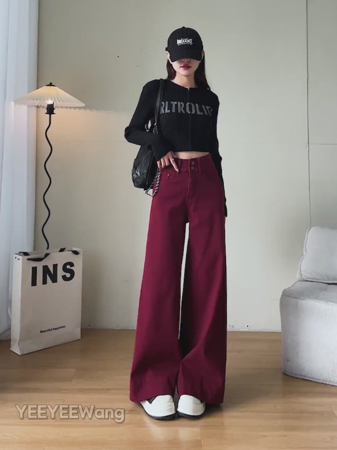 YEEYEEWang Wide-Leg jeans video Fleece-Lined in Dark Cherry: Asian model stands, pockets hands and lifts leg showing drapey fit, camera zooms to waist and cuffed hem revealing thick fleece lining.