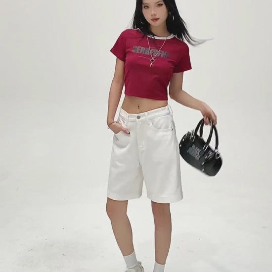 YEEYEEWang Denim Bermuda Shorts in Ivory video: Asian model turns 360, poses sideways and back with hands in pockets, showing high-waist straight cut, knee length and elastic drawstring back waist.