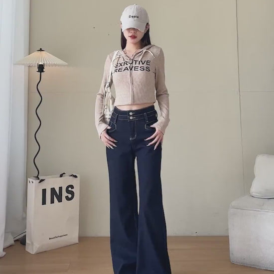 YEEYEEWang Wide-Leg jeans Fleece-Lined video: Asian model walks and lifts legs in Denim Blue jeans, rolls up hems to show thick gray fleece lining, back pockets and waist detail