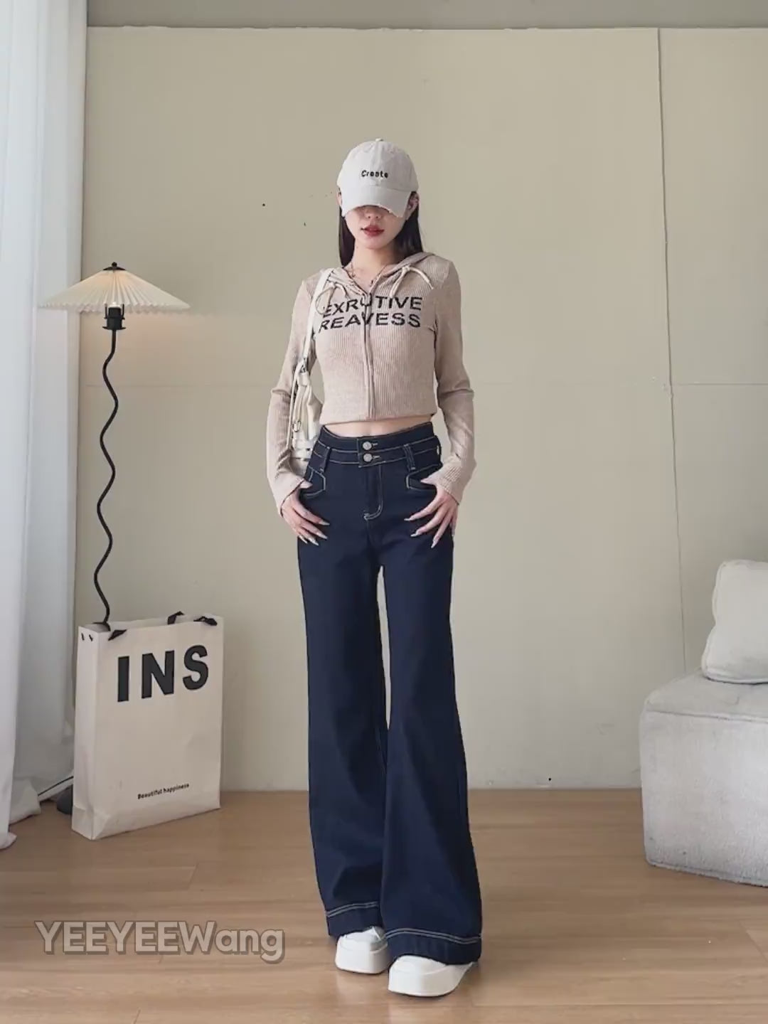 YEEYEEWang Wide-Leg jeans Fleece-Lined video: Asian model walks and lifts legs in Denim Blue jeans, rolls up hems to show thick gray fleece lining, back pockets and waist detail