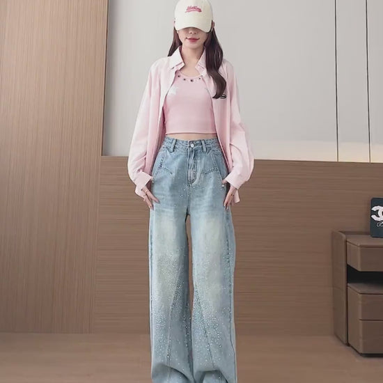 YEEYEEWang Wide-Leg jeans video in Light Blue, Asian model walks in rhinestone high-waist jeans, camera pushes in showing drape, curved seam panels and rolled cuffs