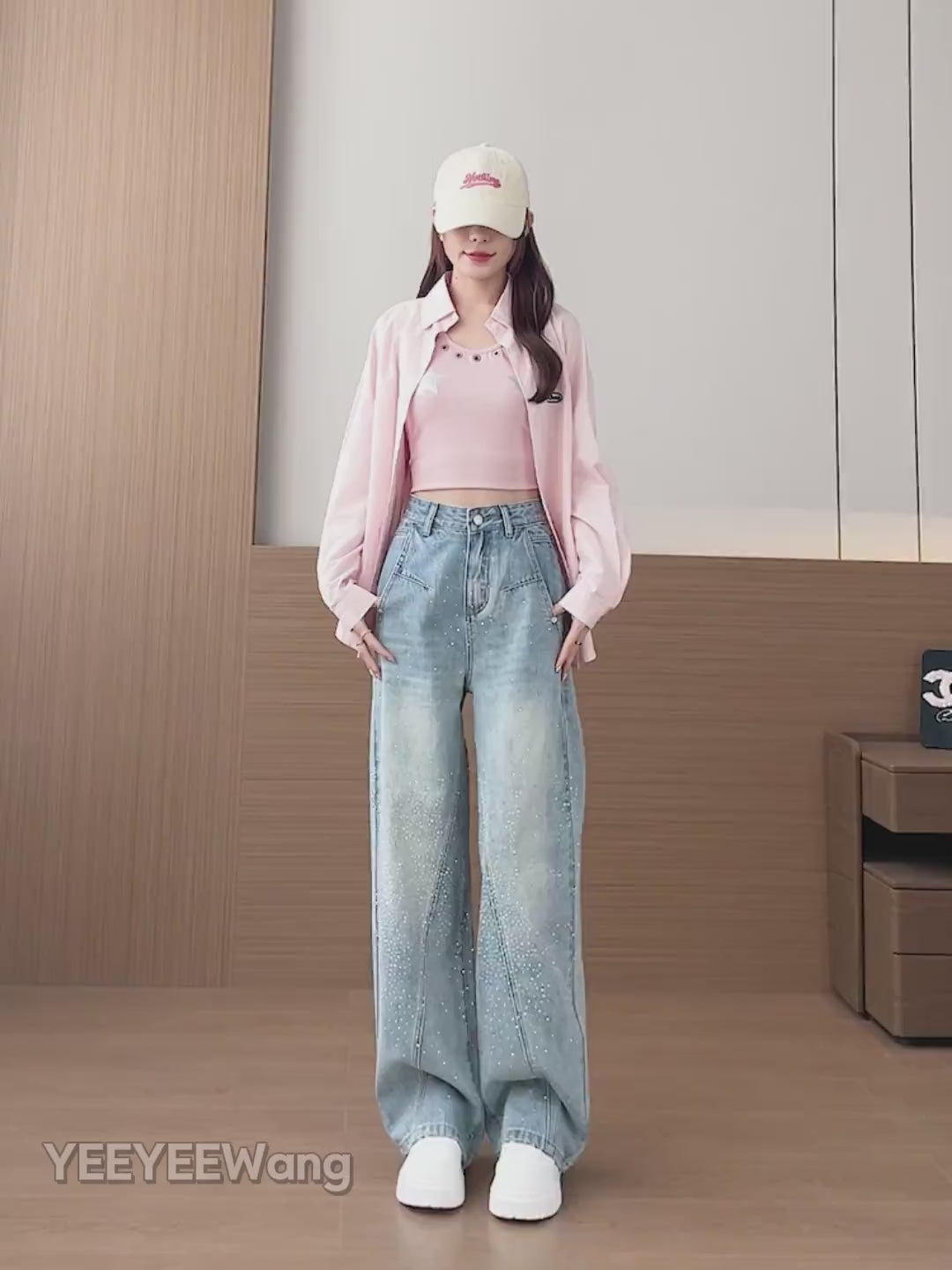 YEEYEEWang Wide-Leg jeans video in Light Blue, Asian model walks in rhinestone high-waist jeans, camera pushes in showing drape, curved seam panels and rolled cuffs