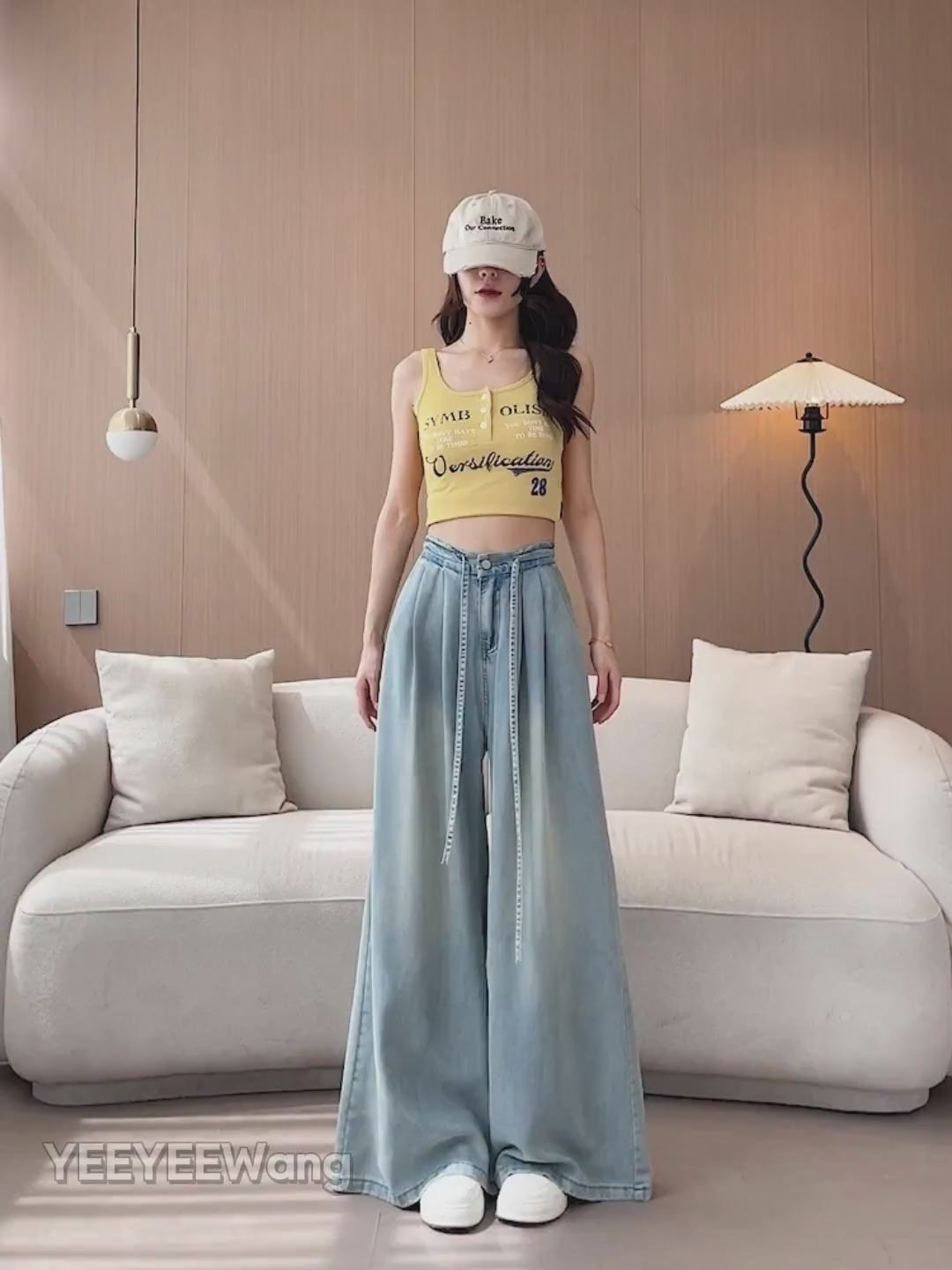 YEEYEEWang Wide-Leg jeans video: Asian model walks and turns in Light Blue high-waist wide-leg jeans with drawstring belt and elastic back waist, lifting legs to show soft drape.