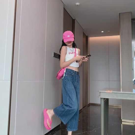 YEEYEEWang Wide-Leg jeans in Vintage Blue video, Asian model walks and poses in hallway as camera zooms to waist and frayed hem, showing drape
