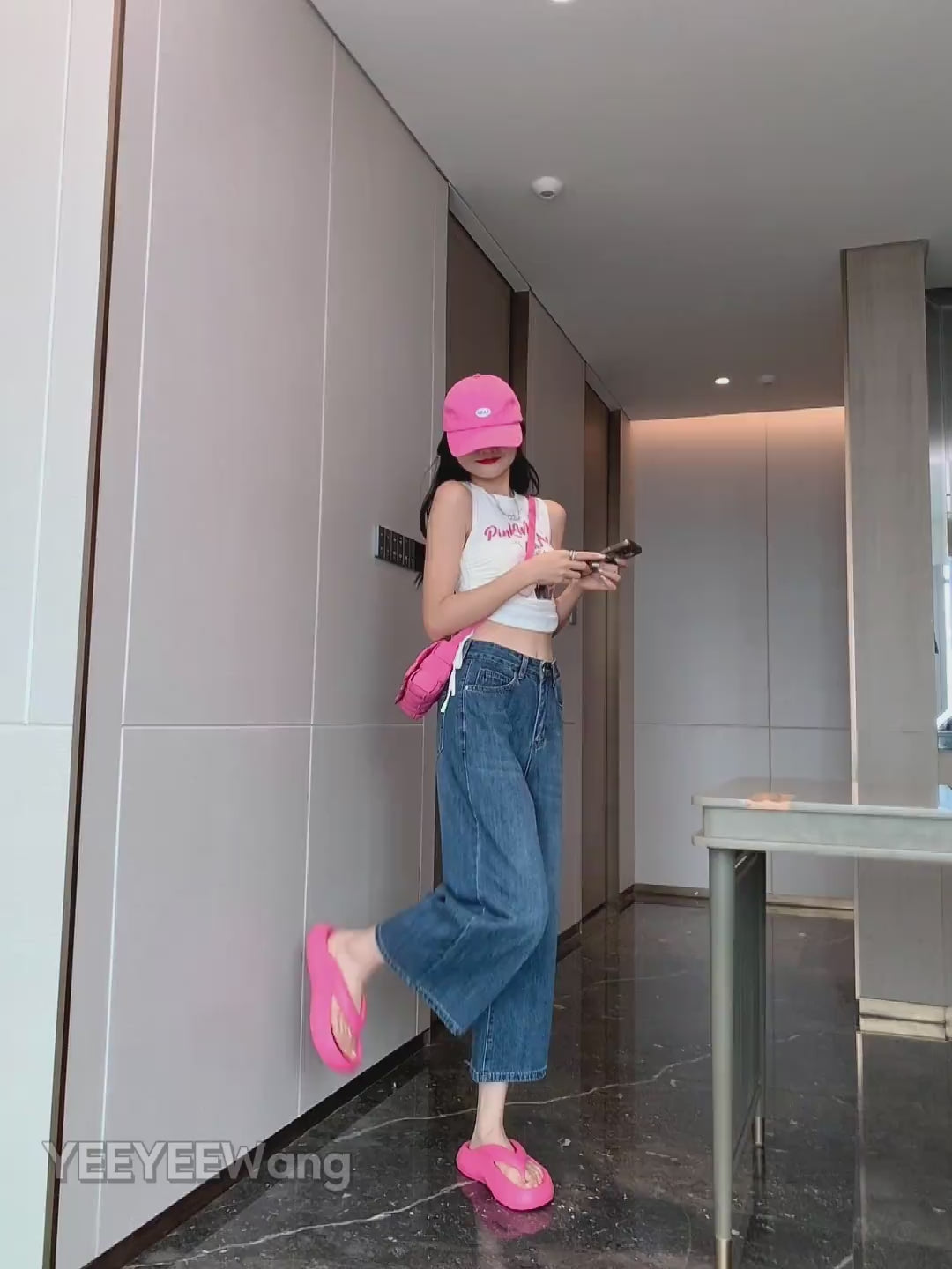 YEEYEEWang Wide-Leg jeans in Vintage Blue video, Asian model walks and poses in hallway as camera zooms to waist and frayed hem, showing drape