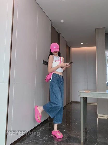 YEEYEEWang Wide-Leg jeans in Vintage Blue video, Asian model walks and poses in hallway as camera zooms to waist and frayed hem, showing drape