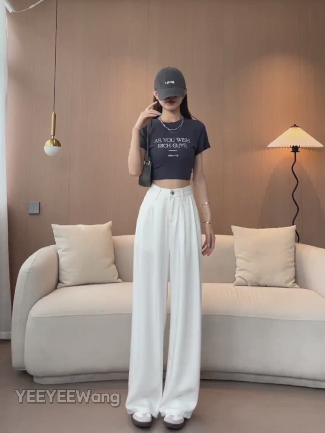 YEEYEEWang Wide-Leg jeans video: Asian model in White poses hand-on-hip, camera moves to high waist and front pleats, then down to leg lift showing wide-leg drape and floor-length hem