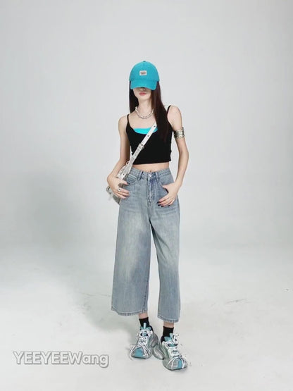 YEEYEEWang Wide-Leg jeans in Light Blue video, Asian model poses in white studio as camera zooms to waist and back pockets, showing fabric drape