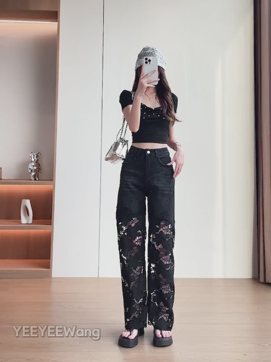 YEEYEEWang Wide-Leg jeans video: Asian model in Solid Black high-waist jeans with lace paneling and rhinestones, posing, turning and lifting leg to show drape and sheer lace details